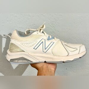 New Balance white and pastel blue Women’s 857 Crosstraining shoes